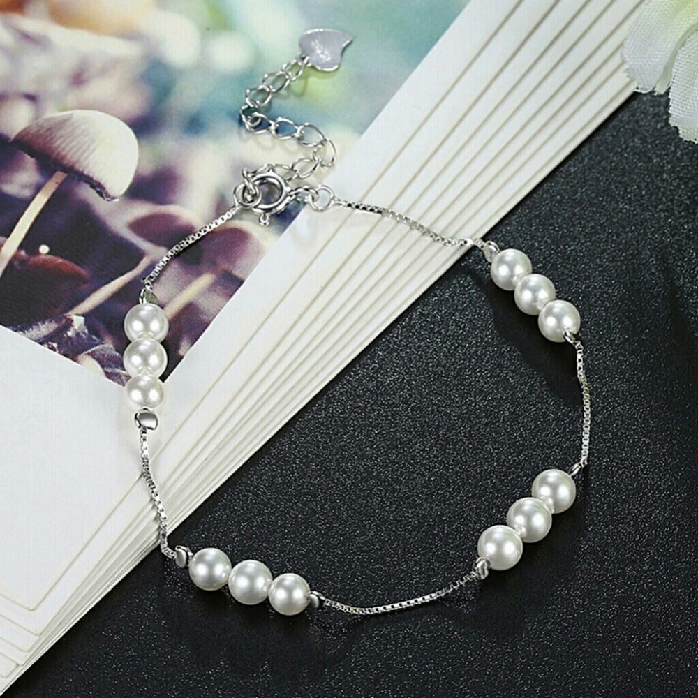 Elegant sterling silver and pearl bracelet.